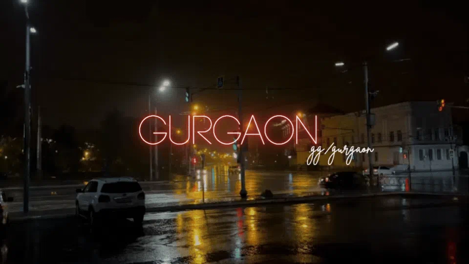 Gurgaon at night, with rain reflecting the city lights